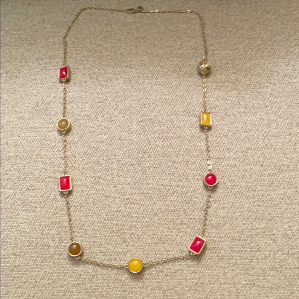 Gold necklace with pink and yellow stones